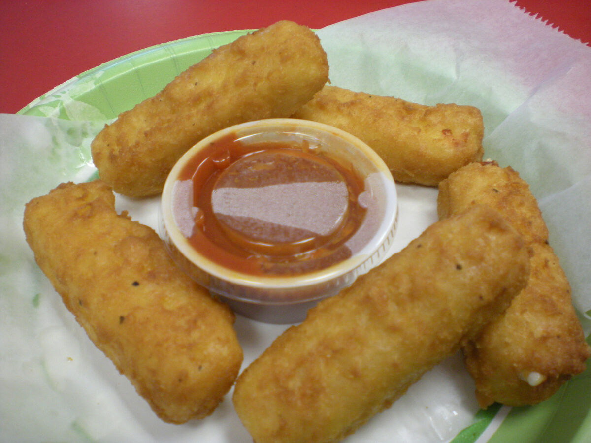 Golden mozzarella sticks with marinara sauce at Las Vegas Pizza West Chester PA